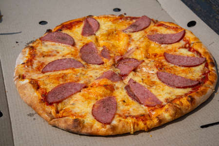 Fresh baked pepperoni pizza, shallow depth of field