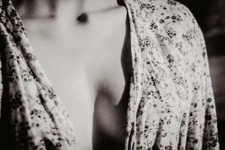 beautiful woman's upper body, a robe that covers her breastsの写真素材
