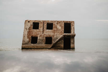 The construction of concrete wartime bunkers on the shores of the Baltic Sea collapsed. Liepaja,Latviaの写真素材