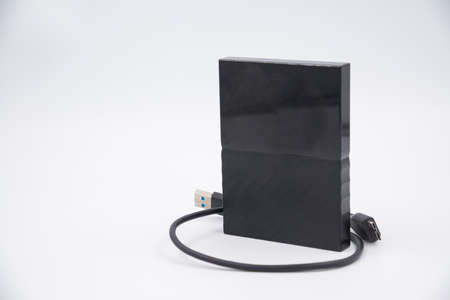 External Hdd drives 2.5 and 3.5 inch and flash drives on white isolated background