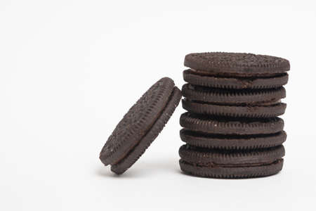 soft dark chocolate brownie cookies on white background.