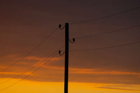 silhouette of high electric power pole with Copy-Space.の写真素材