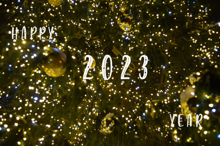 defocused Christmas tree with Christmas lights and decorations.の写真素材