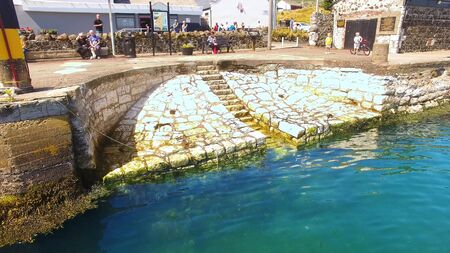 Aryas Steps Carnlough Harbour Glencloy Co. Antrim Northern Irelandの写真素材