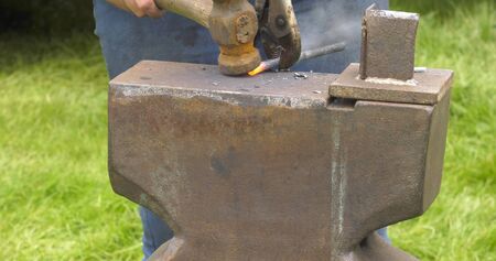 blacksmirh anvil and hammer at Shanes Castle May Day Steam Rally Estate Antrim Northern Ireland on 6th May 2019 Editioralの写真素材
