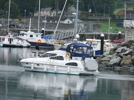 Boat in Glenarm Marina harbour Co. Antrim N. Irelandの写真素材