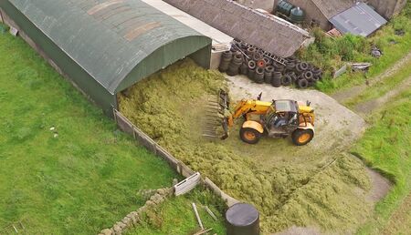Buckraking silage in Irelandの写真素材