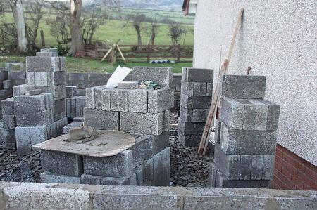 Building new homes at a construction site in Ireland including roofers joiners builders painters labourers,の写真素材