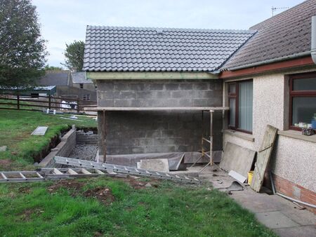 Building new homes at a construction site in Ireland including roofers joiners builders painters labourers,の写真素材