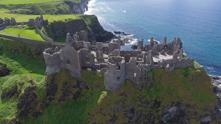 Dunluce Castle  Northern Ireland Sea background space for editors text copyの写真素材