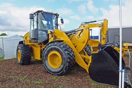 Yellow mechanical shovel