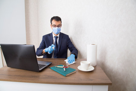 Officer wearing a mask to protect the work area from coronavirusの写真素材