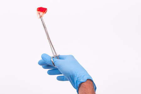 sterile, clamp used for surgery and white bacground