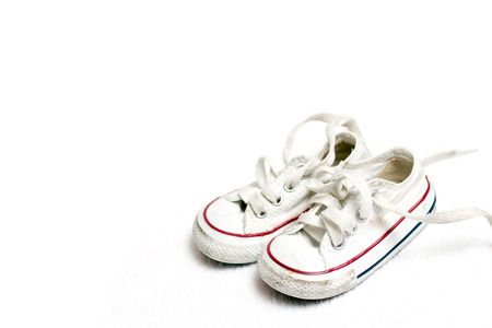 pair of cute little sneakersの写真素材