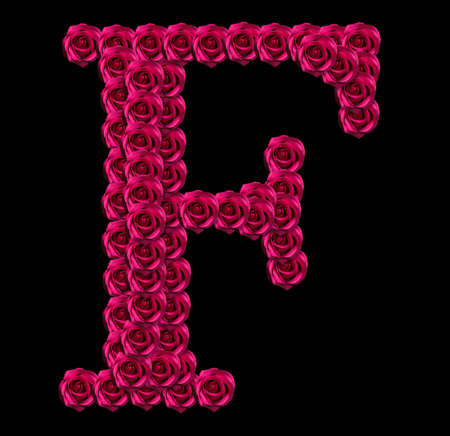 romantic concept image of a capital letter F made of red roses. Isolated on black background. Design element for love or valentines themesの写真素材