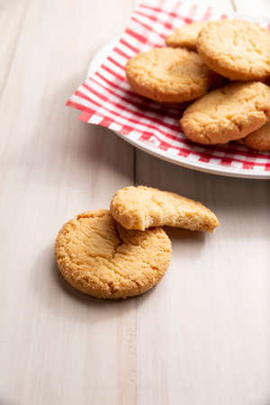 Homemade crunchy cookies on a white wooden rustic tableの写真素材