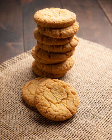 Pile of Homemade crunchy cookies on wooden rustic tableの写真素材
