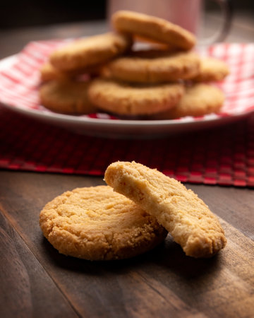 Close up of Homemade crunchy cookies on broun wooden rustic tableの写真素材