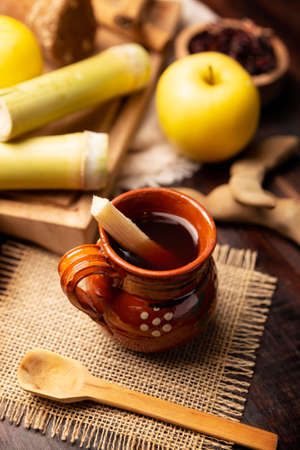 Fruit punch. Christmas fruit punch is an infusion that is consumed in Mexico, traditionally during posadas and Christmas. Served in a clay cup called jarrito or cantaritoの写真素材