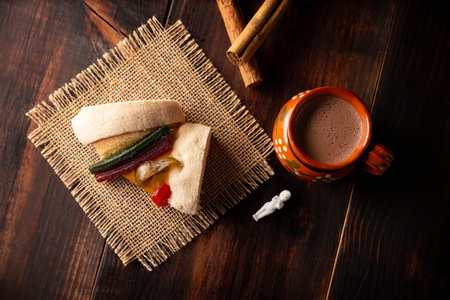 Traditional Kings day cake also called Rosca de Reyes, roscon, Epiphany Cake and with a clay Jarrito. Mexican tradition on January 5thの写真素材