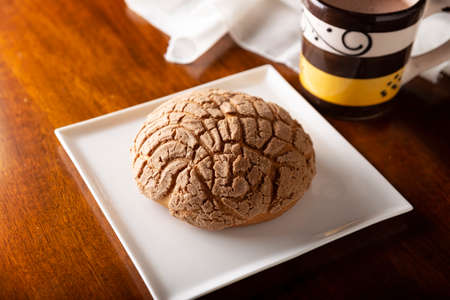 shells. Mexican sweet bread roll with seashell-like appearance, Usually eaten with coffee or hot chocolate at breakfast or as an afternoon snack.の写真素材
