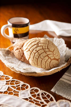 shells. Mexican sweet bread roll with seashell-like appearance, Usually eaten with coffee or hot chocolate at breakfast or as an afternoon snack.の写真素材