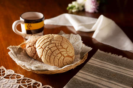 shells. Mexican sweet bread roll with seashell-like appearance, Usually eaten with coffee or hot chocolate at breakfast or as an afternoon snack.の写真素材