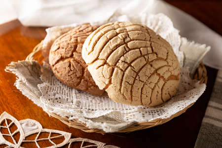shells. Mexican sweet bread roll with seashell-like appearance, Usually eaten with coffee or hot chocolate at breakfast or as an afternoon snack.の写真素材