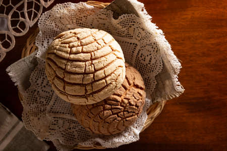 shells. Mexican sweet bread roll with seashell-like appearance, Usually eaten with coffee or hot chocolate at breakfast or as an afternoon snack.の写真素材
