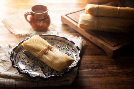 Tamales. Prehispanic dish typical of Mexico and some Latin American countries. Corn dough wrapped in...