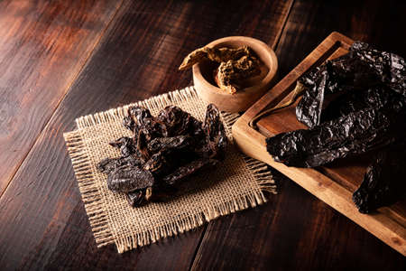 Variety of dried mexican chili. Chile Morita, Chipotle and Pasilla, This Mexican chili is the dried form chilaca chili and are used in a variety of Mexican preparations.の写真素材
