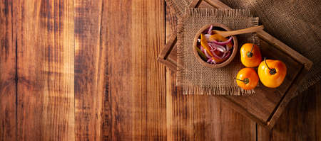 Chopped purple onion with manzano chili and spices, a very popular preparation in Mexico to accompany a wide variety of dishes. Panoramic image.の写真素材
