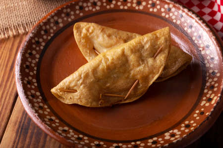 Golden quesadillas. Fried quesadillas made with corn tortillas, they can be filled with any dish or...