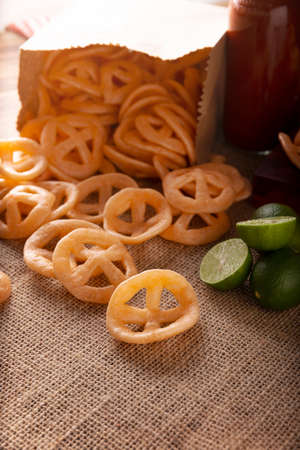 Flour cracklings. Also known as duros, duritos, Mexican wagon wheels or pinwheels, they are a very popular snack made from flour, commonly accompanied with hot sauce and lemon juice.の写真素材