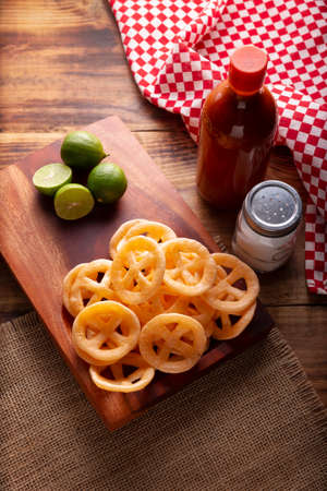 Flour cracklings. Also known as duros, duritos, Mexican wagon wheels or pinwheels, they are a very popular snack made from flour, commonly accompanied with hot sauce and lemon juice.の写真素材