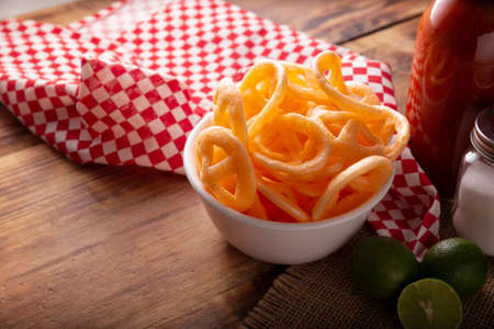 Flour cracklings. Also known as duros, duritos, Mexican wagon wheels or pinwheels, they are a very popular snack made from flour, commonly accompanied with hot sauce and lemon juice.の写真素材