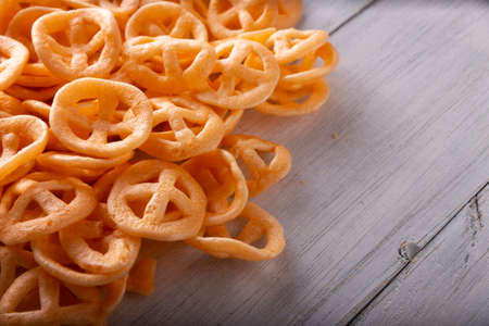 Flour cracklings. Also known as duros, duritos, Mexican wagon wheels or pinwheels, they are a very popular snack made from flour, commonly accompanied with hot sauce and lemon juice.の写真素材