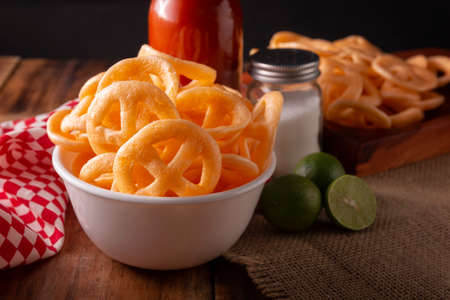 Flour cracklings. Also known as duros, duritos, Mexican wagon wheels or pinwheels, they are a very popular snack made from flour, commonly accompanied with hot sauce and lemon juice.の写真素材
