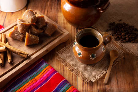 Coffee pot. Traditional Mexican coffee and basic ingredients for its preparation, coffee, cinnamon...