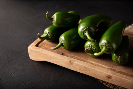 Serrano Chile or Green Chile. (Capsicum annum). Very popular variety of hot chili in Mexican cuisine, it is commonly consumed fresh in a wide variety of sauces and dishes.の写真素材