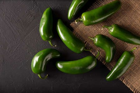 Serrano Chile or Green Chile. (Capsicum annum). Very popular variety of hot chili in Mexican cuisine, it is commonly consumed fresh in a wide variety of sauces and dishes.の写真素材