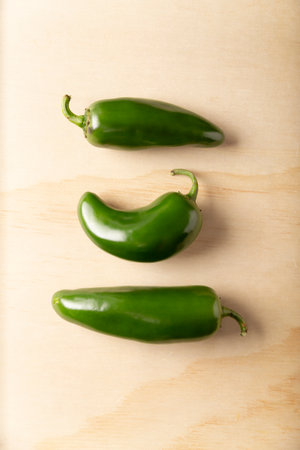 Serrano Chile or Green Chile. (Capsicum annum). Very popular variety of hot chili in Mexican cuisine, it is commonly consumed fresh in a wide variety of sauces and dishes.の写真素材
