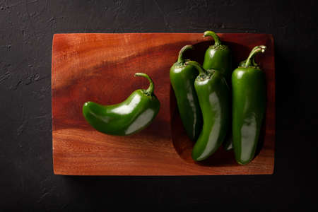 Serrano Chile or Green Chile. (Capsicum annum). Very popular variety of hot chili in Mexican cuisine, it is commonly consumed fresh in a wide variety of sauces and dishes.の写真素材
