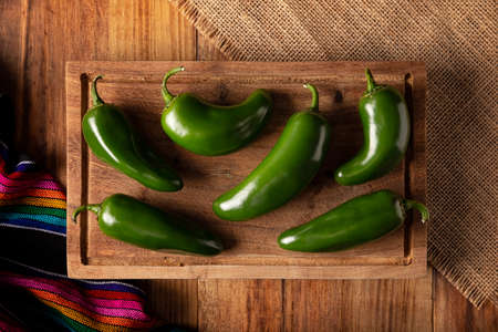 Serrano Chile or Green Chile. (Capsicum annum). Very popular variety of hot chili in Mexican cuisine, it is commonly consumed fresh in a wide variety of sauces and dishes.の写真素材