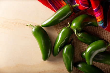 Serrano Chile or Green Chile. (Capsicum annum). Very popular variety of hot chili in Mexican cuisine, it is commonly consumed fresh in a wide variety of sauces and dishes.の写真素材