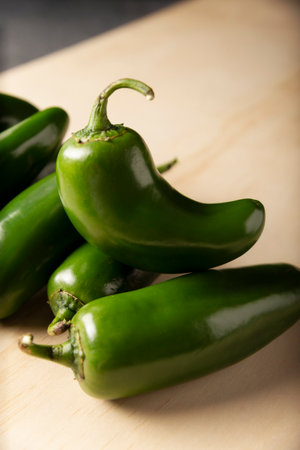 Serrano Chile or Green Chile. (Capsicum annum). Very popular variety of hot chili in Mexican cuisine, it is commonly consumed fresh in a wide variety of sauces and dishes.の写真素材