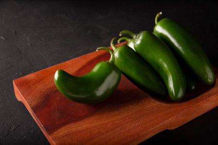 Serrano Chile or Green Chile. (Capsicum annum). Very popular variety of hot chili in Mexican cuisine, it is commonly consumed fresh in a wide variety of sauces and dishes.の写真素材