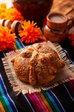 Dead Bread. Typical Mexican sweet bread with sesame seeds, that is consumed in the season of the day of the dead. It is a main element in the altars and offerings in the festivityの写真素材