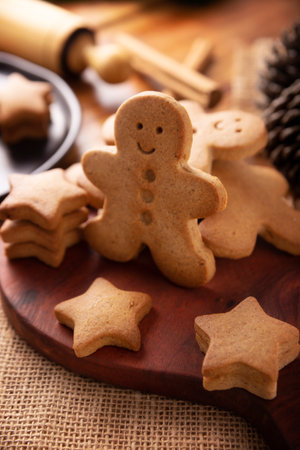 Homemade gingerbread men cookies and star shaped cookies, traditionally made at Christmas and the holidays.の写真素材