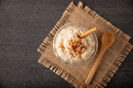 Rice pudding. Sweet dish made by cooking rice in milk and sugar, some recipes include cinnamon, vanilla or other ingredients, it is a very easy dessert to make and very popular all over the world.の素材 [FY310197429162]